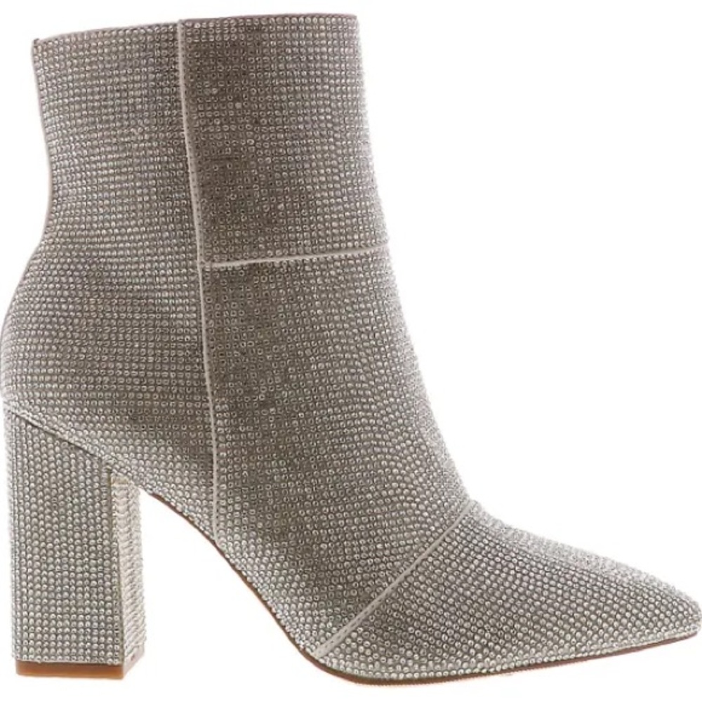 Side zipper
Man-made upper
Cushioned insole
3.5-inch heel
Rhinestones
Silver